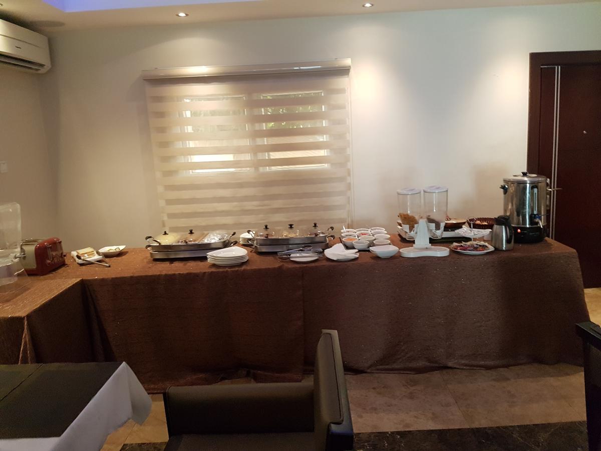 Check Inn Hotel Abuja Extérieur photo